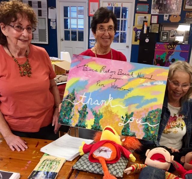 L: Dayle Herstik, Elaine Bossik, Vera Hirschhorn with gift from Milagro teens.
